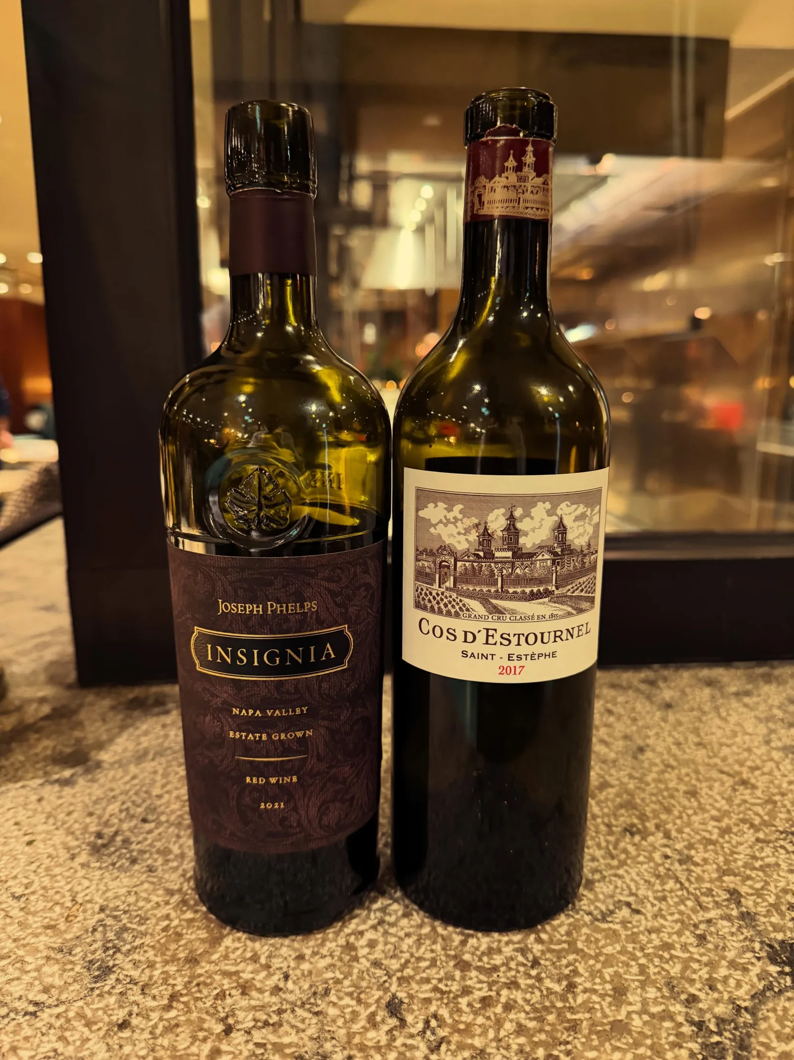 Cos d’Estournel and Joseph Phelps Insignia bottles