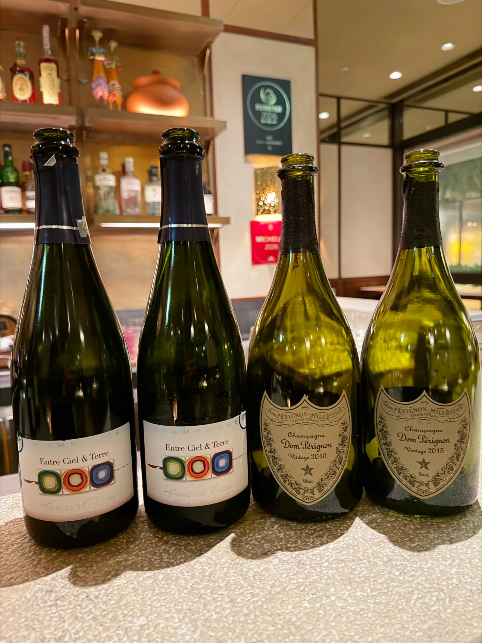 Dom Pérignon and grower Champagne bottles